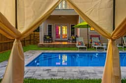 Sleeps 21 Beach Estate: Pool, Slide, Golf Sim - Image 2